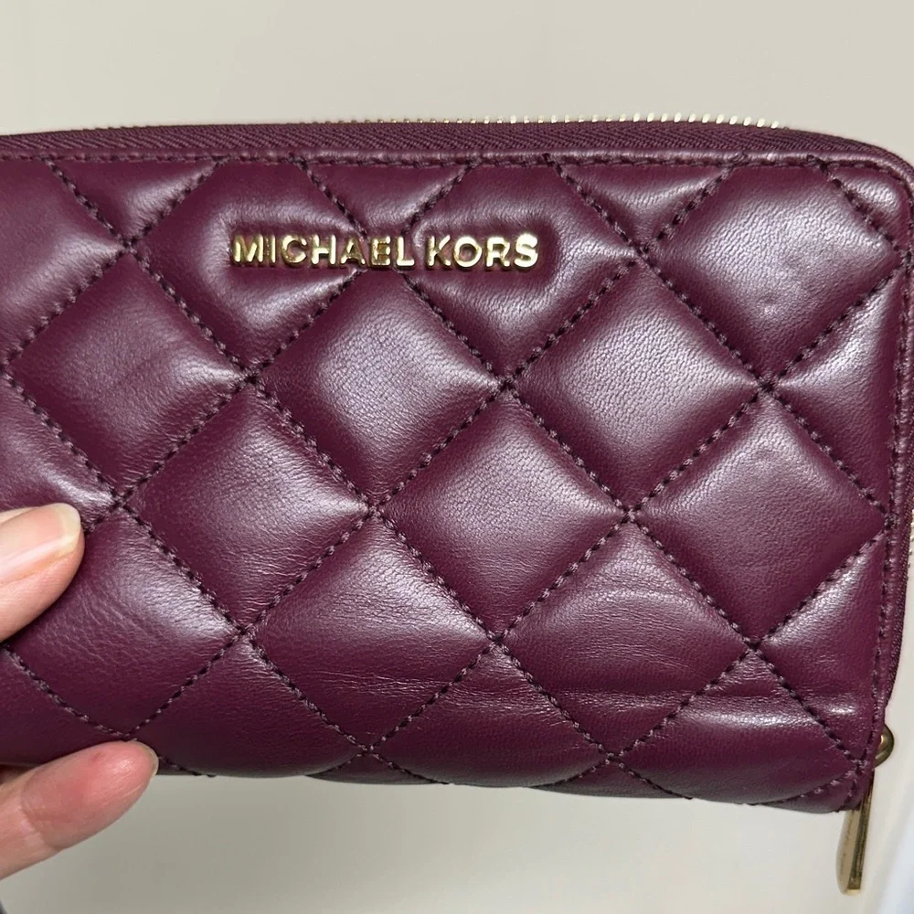 Michael Kors Plum Quilted Wristlet/ wallet